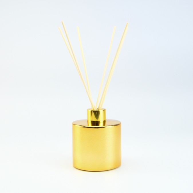 set-parfumfles-cylinder-goud-met-gouden-schroefdop-geurstokjes-200ml